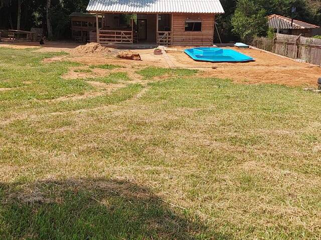 #2055 - CASAS EM CONDOMÍNIO FECHADO para Venda em Viamão - RS - 2