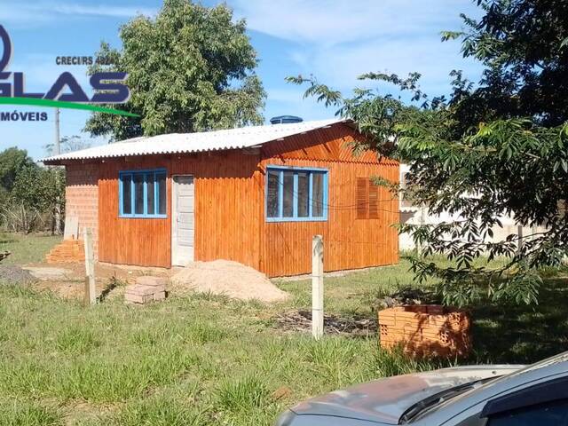 #2410 - CASAS EM CONDOMÍNIO FECHADO para Venda em Viamão - RS