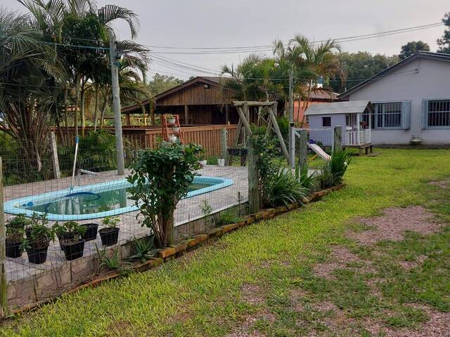 #2445 - CASAS EM CONDOMÍNIO FECHADO para Venda em Viamão - RS